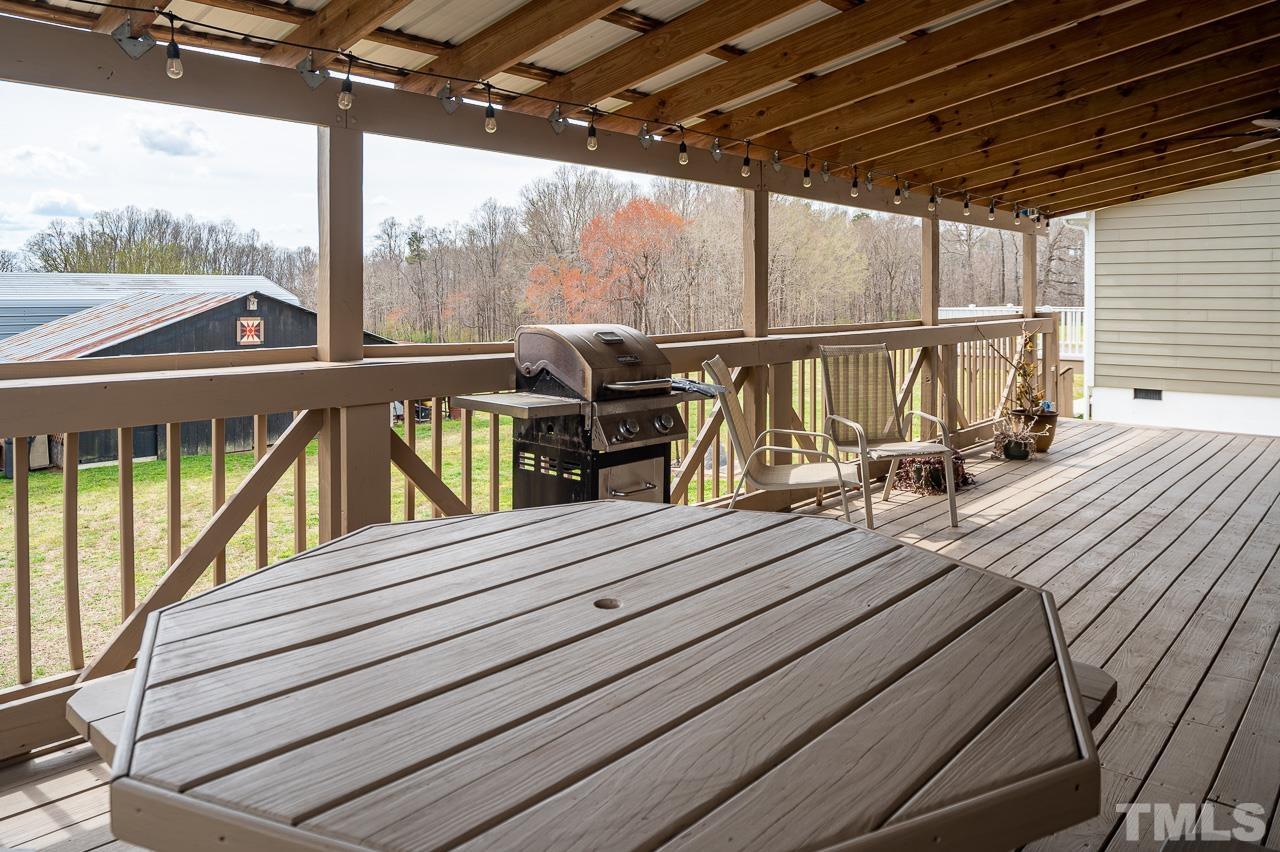 6668 Roby Coe Road Ramseur, NC 27316 - Photo 44 of 59 a view of a balcony with chairs
