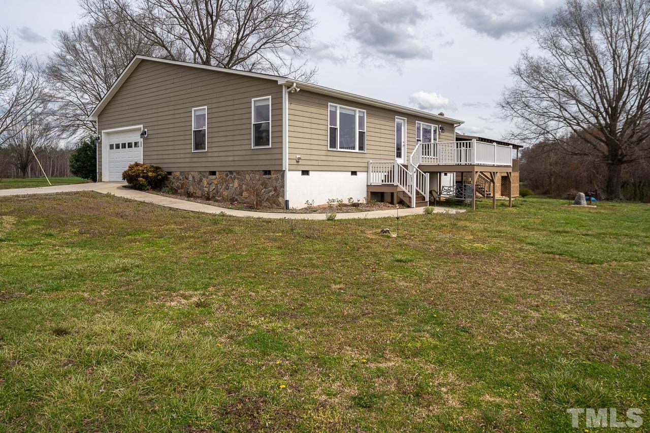 6668 Roby Coe Road Ramseur, NC 27316 - Photo 47 of 59 a front view of house with yard and trees around