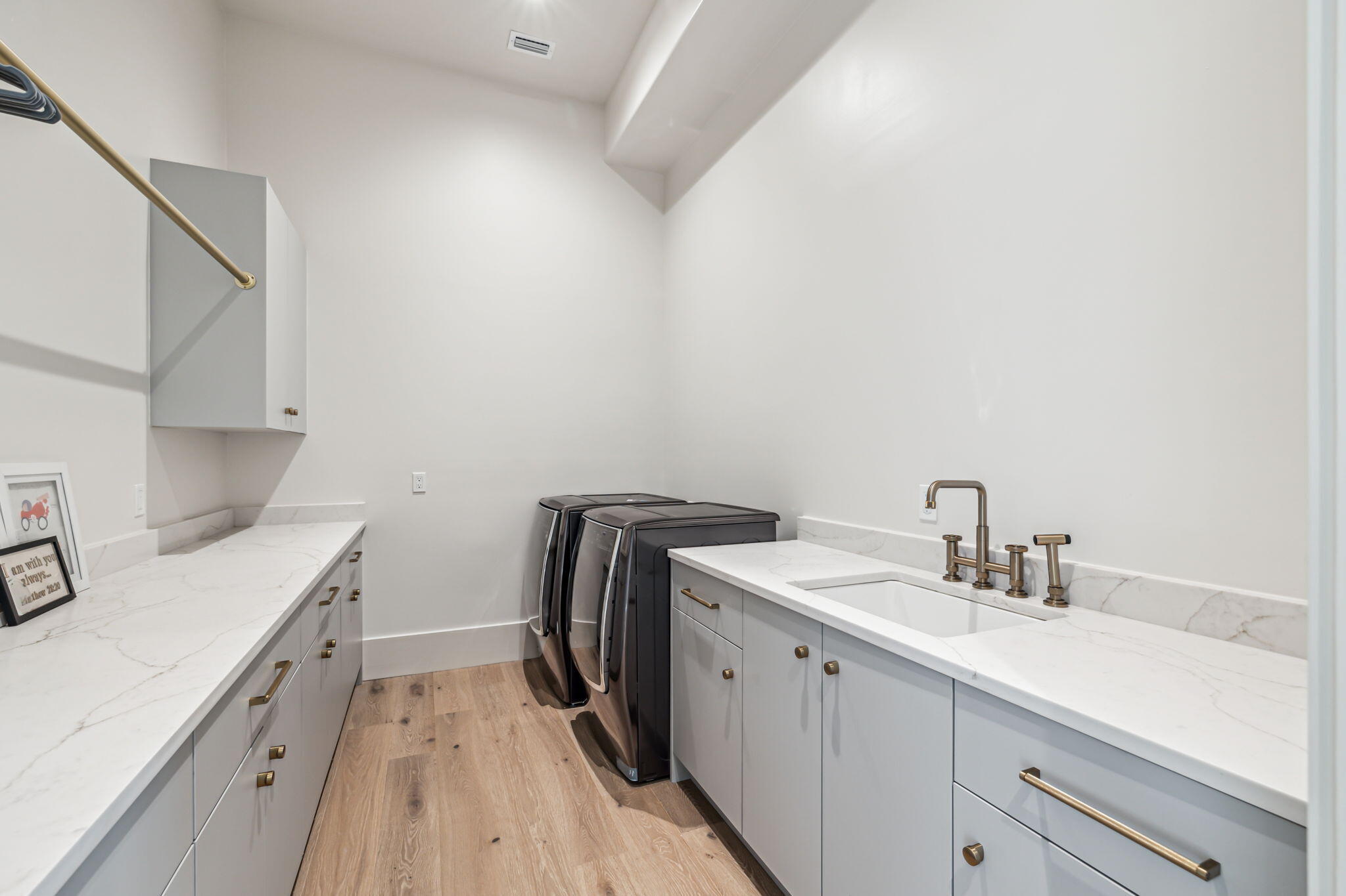 11 Sundew Pl Inlet Beach Inlet Beach, FL 32461 - Photo 16 of 51 a utility room with cabinets washer and dryer