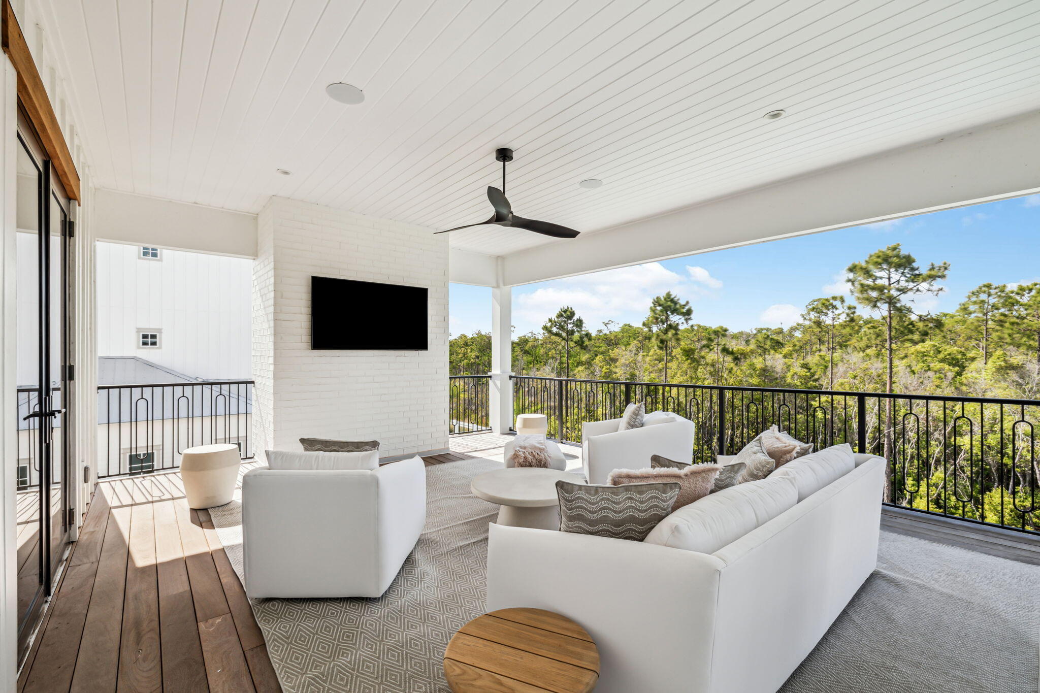 11 Sundew Pl Inlet Beach Inlet Beach, FL 32461 - Photo 27 of 51 a living room with furniture floor to ceiling window and a flat screen tv