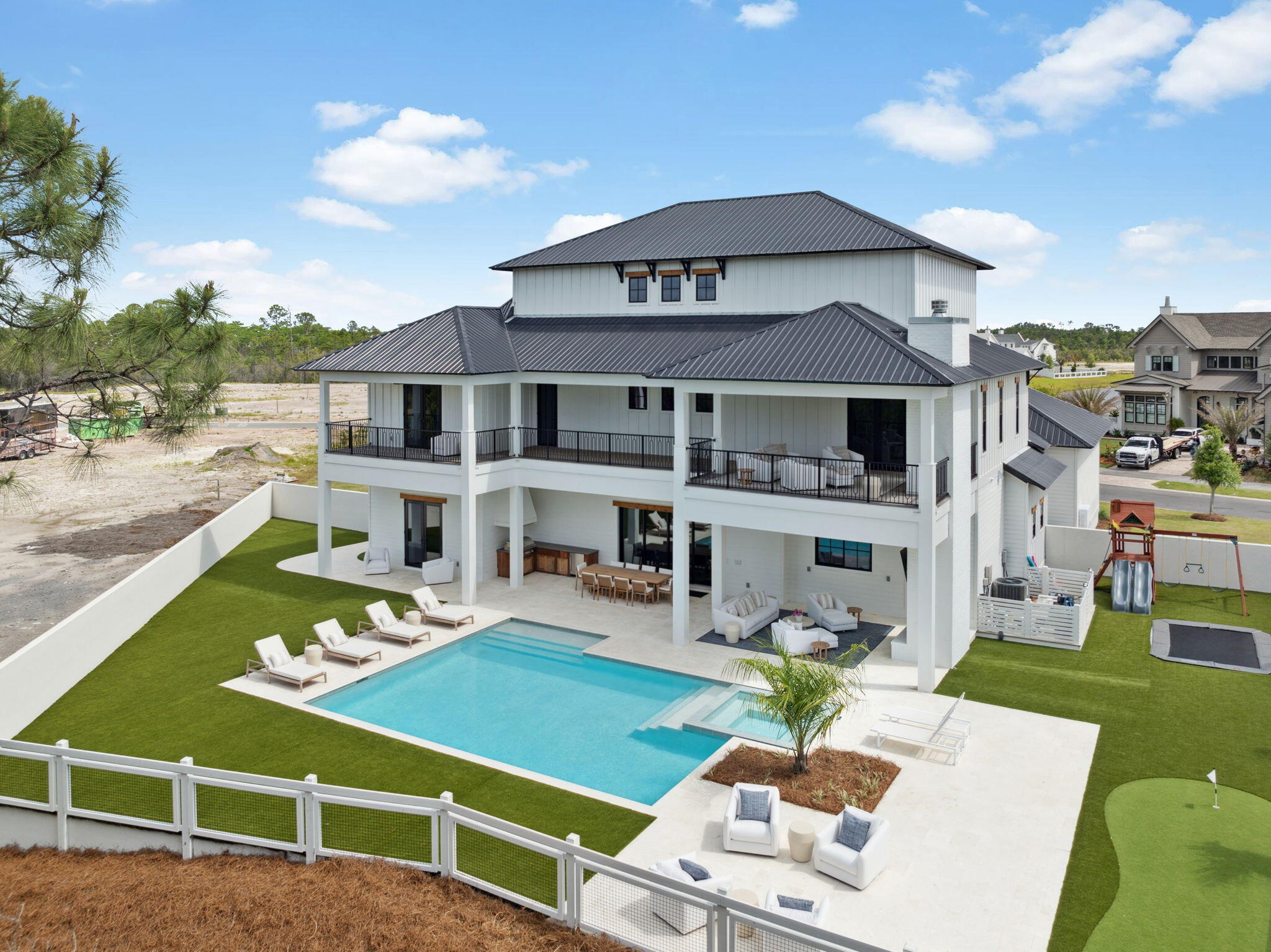 11 Sundew Pl Inlet Beach Inlet Beach, FL 32461 - Photo 4 of 51 a view of a patio with couches table and chairs with potted plants