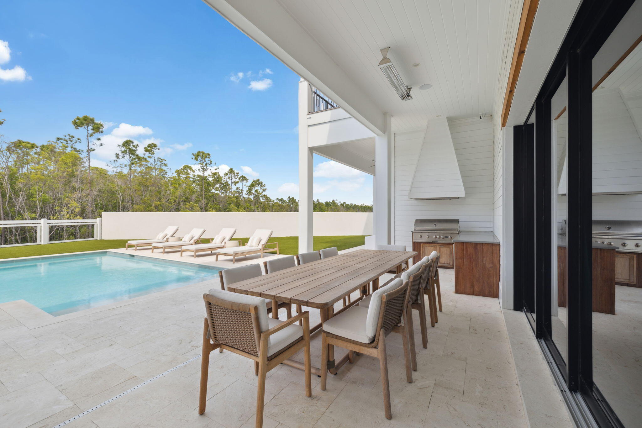 11 Sundew Pl Inlet Beach Inlet Beach, FL 32461 - Photo 43 of 51 a view of a dining room with furniture and a floor to ceiling window