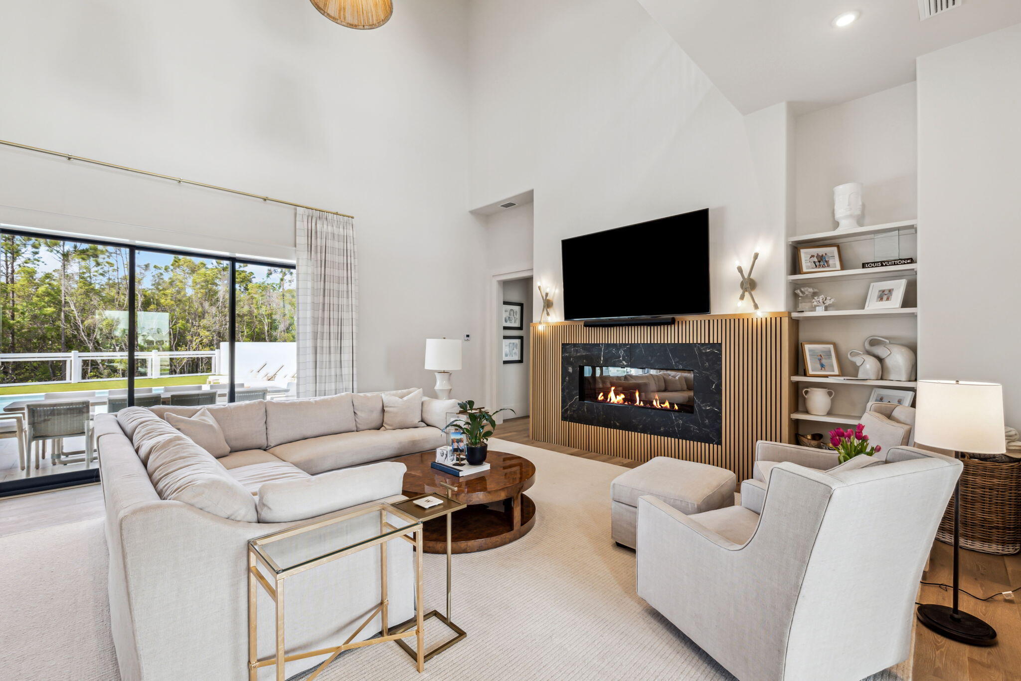 11 Sundew Pl Inlet Beach Inlet Beach, FL 32461 - Photo 8 of 51 a living room with furniture a fireplace and a flat screen tv