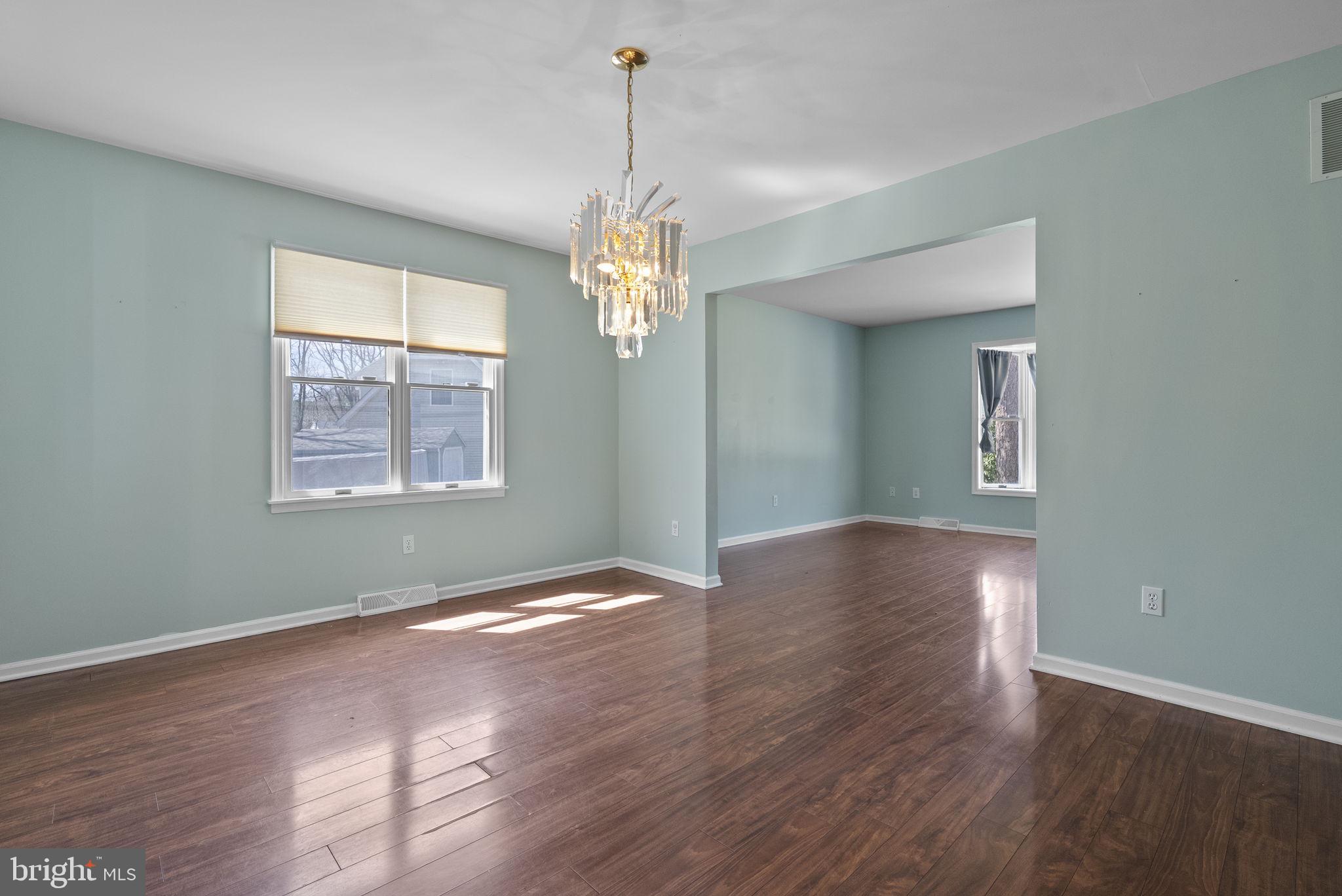 218 Crestview Avenue Absecon, NJ 08205 - Photo 15 of 67 a view of a livingroom with wooden floor and a window