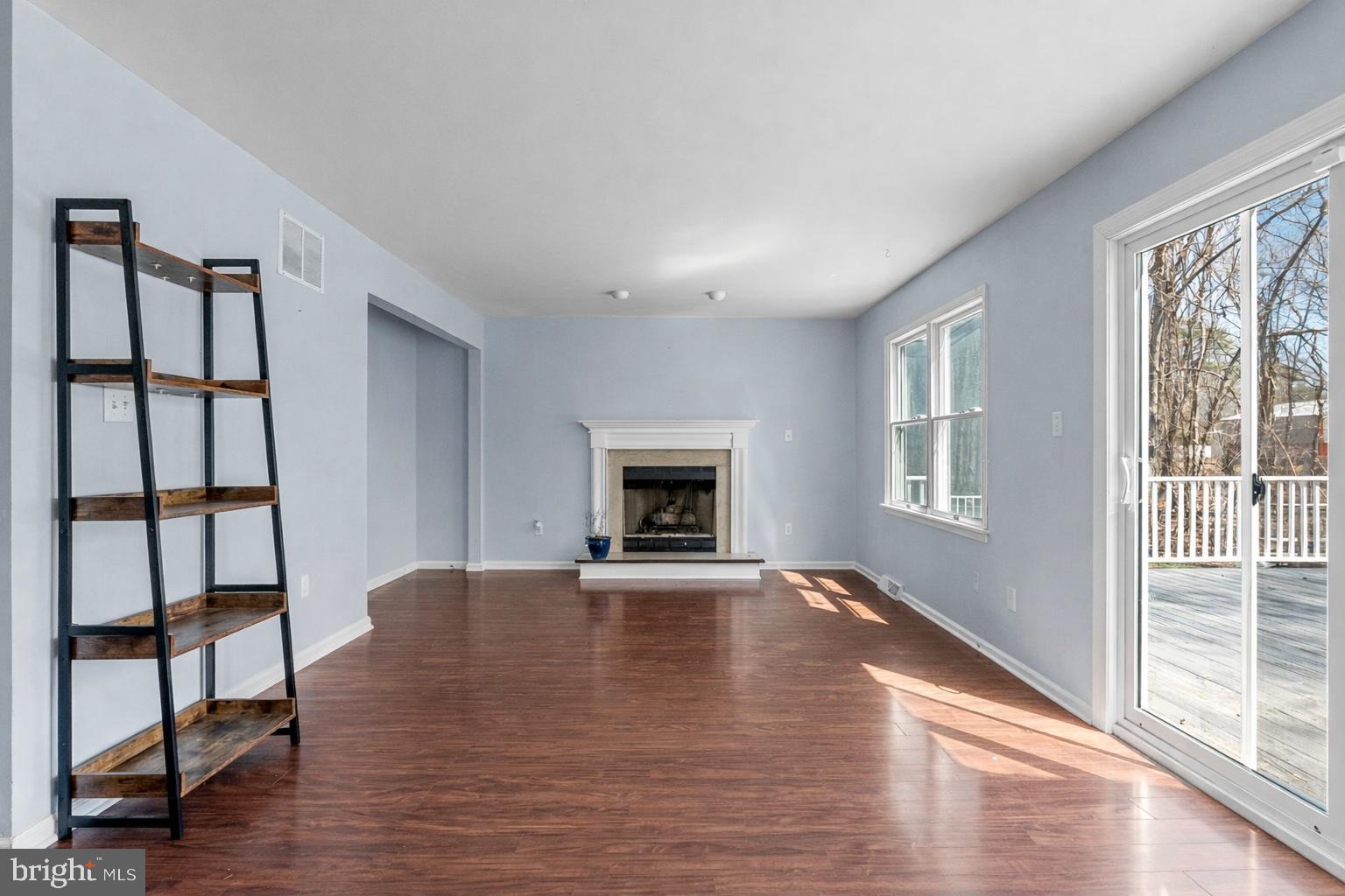 218 Crestview Avenue Absecon, NJ 08205 - Photo 23 of 67 a view of an empty room with window and wooden floor