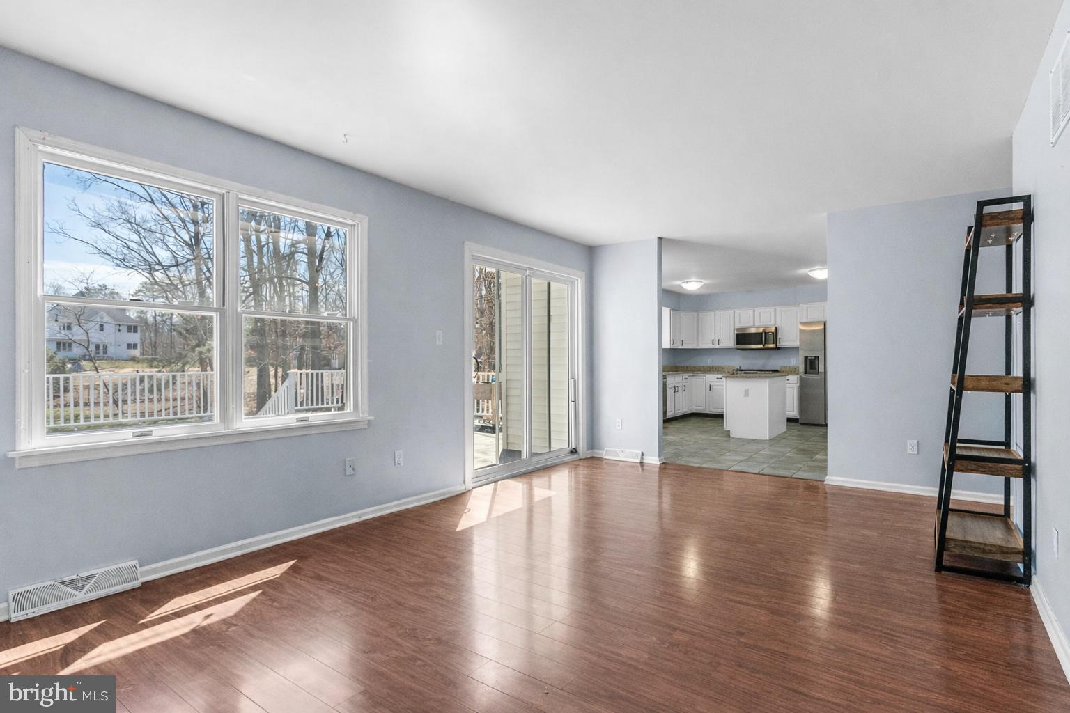 218 Crestview Avenue Absecon, NJ 08205 - Photo 24 of 67 a view of an empty room with a window and wooden floor