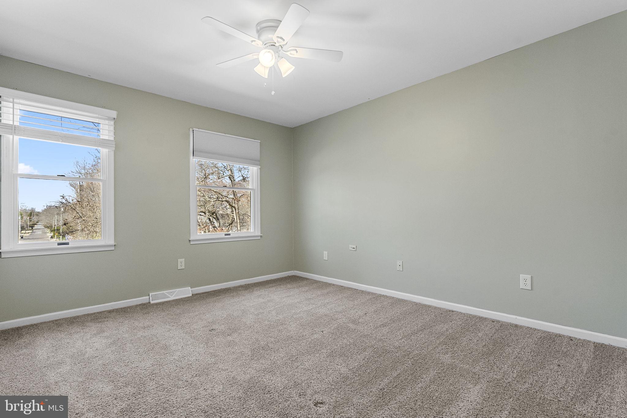 218 Crestview Avenue Absecon, NJ 08205 - Photo 33 of 67 an empty room with windows and fan