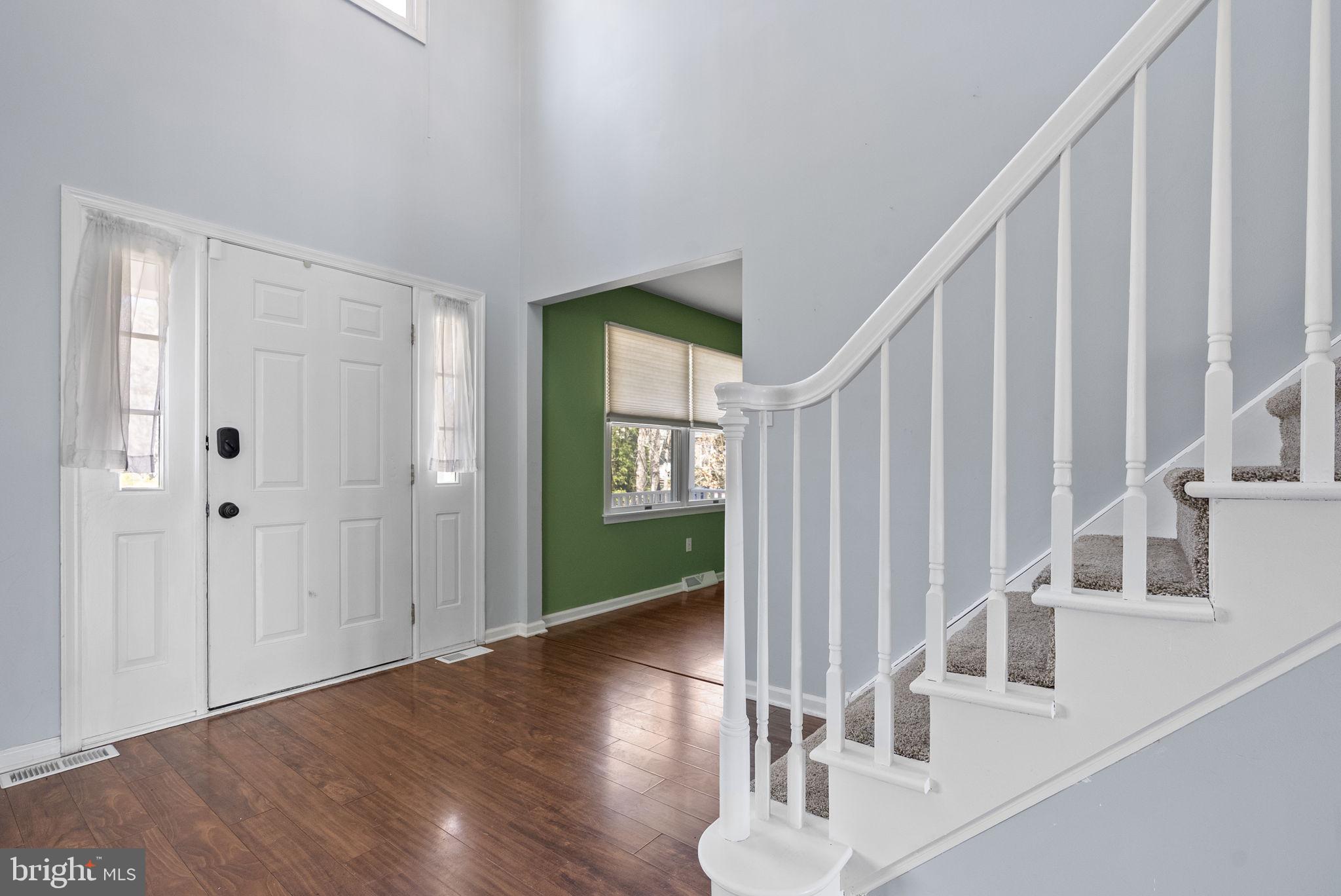 218 Crestview Avenue Absecon, NJ 08205 - Photo 5 of 67 a view of entryway and hall with wooden floor