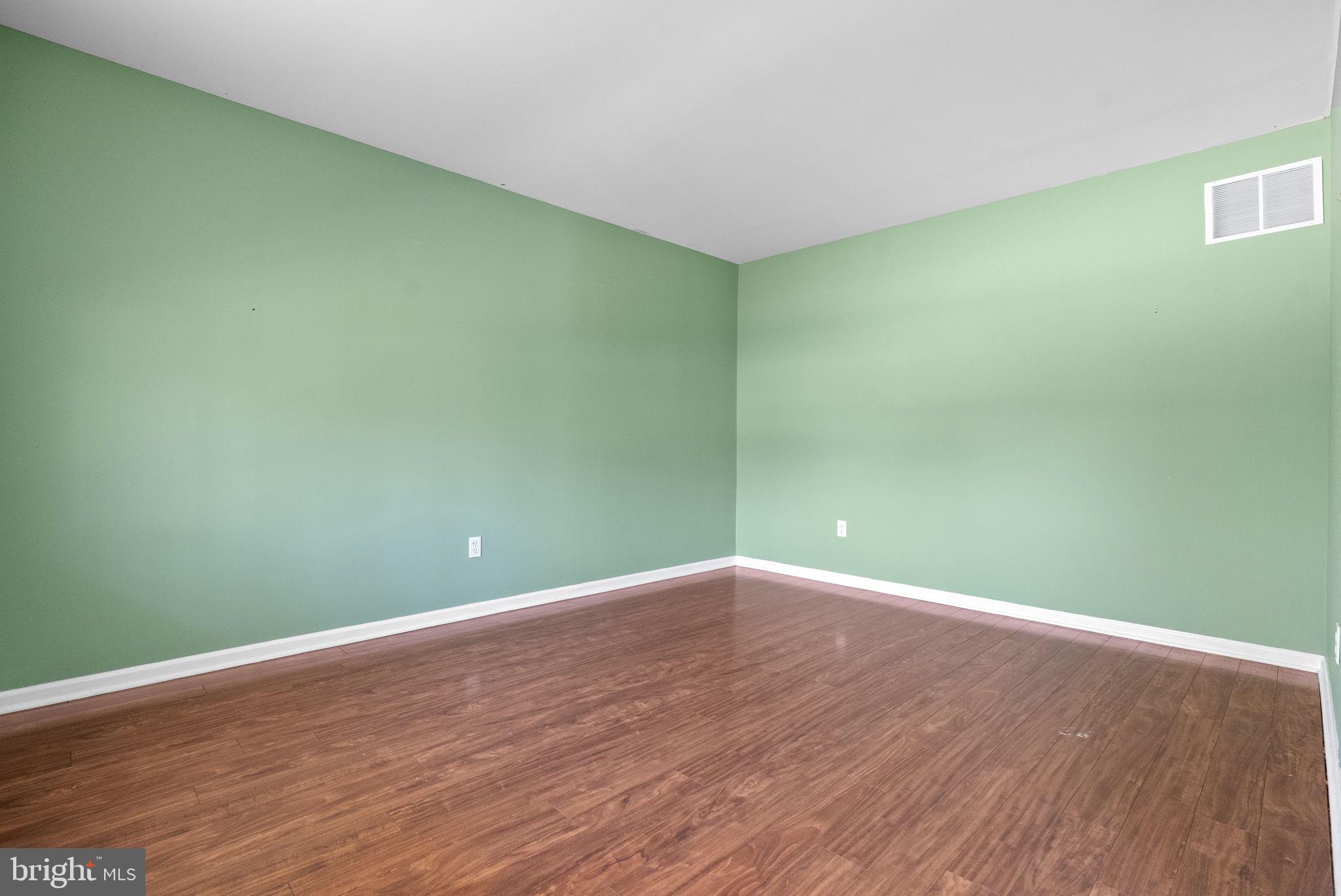 218 Crestview Avenue Absecon, NJ 08205 - Photo 9 of 67 a view of empty room with wooden floor
