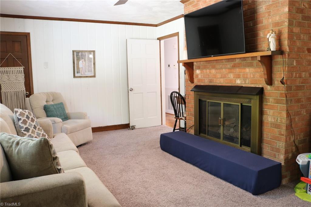 8455 Jefferson Church Road Rural Hall, NC 27045 - Photo 18 of 31 Den with fireplace