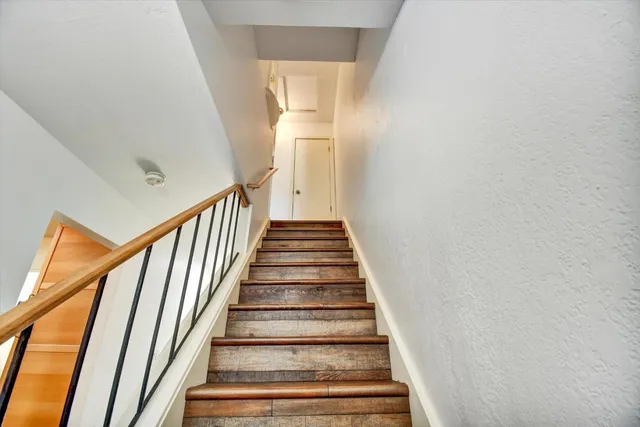 a workspace with furniture and wooden floor