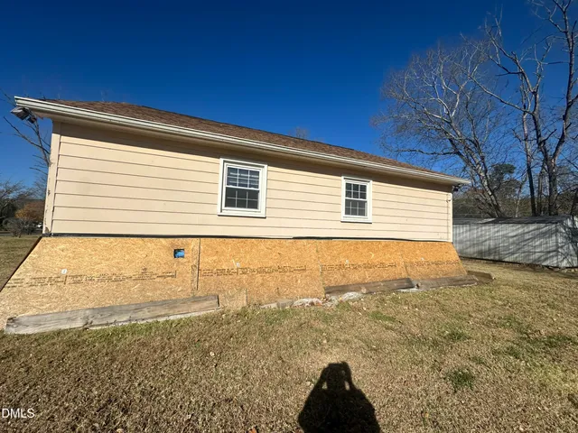 a view of a yard from a balcony