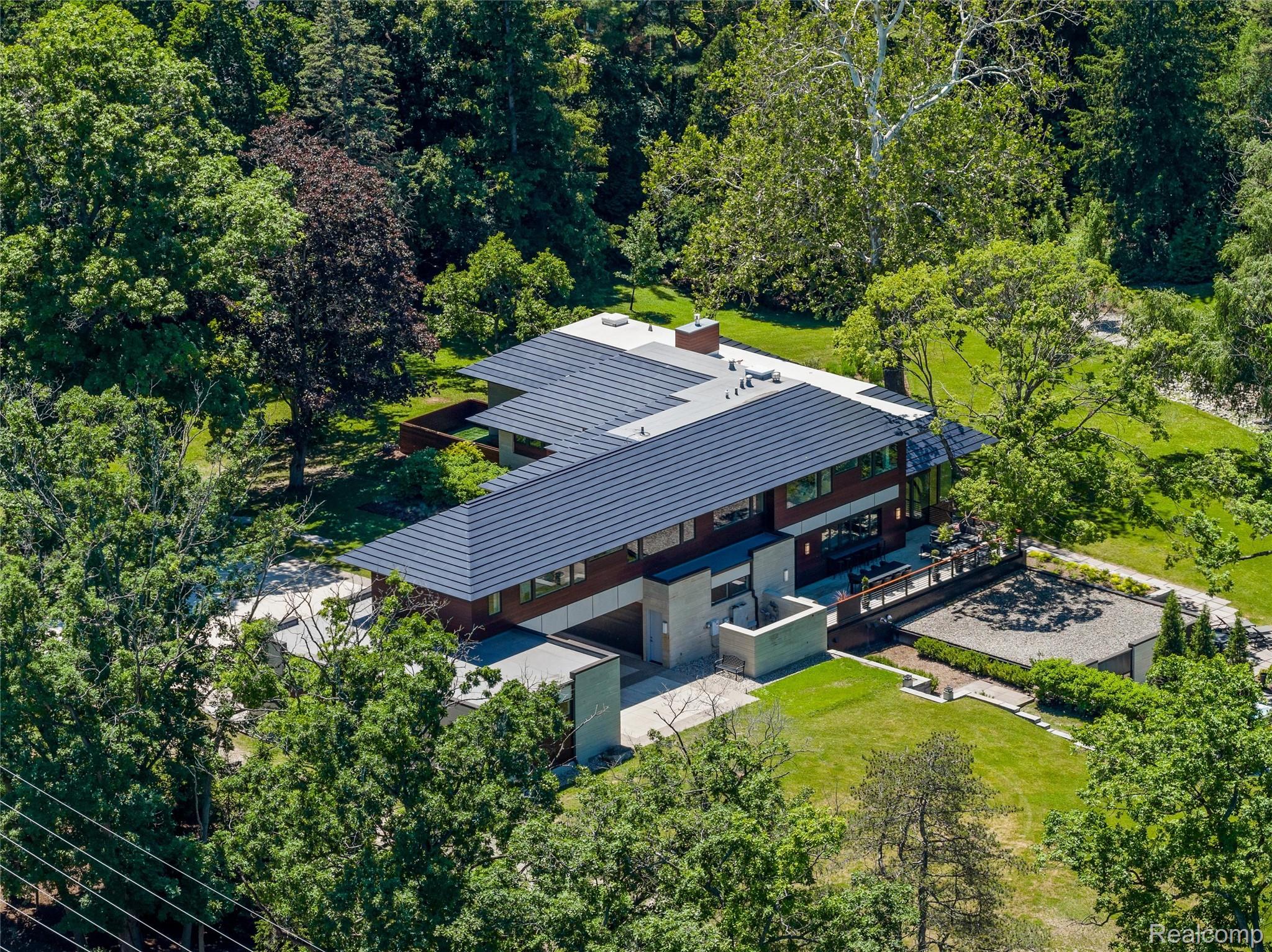 2700 Squirrel Road Bloomfield Hills, MI 48304 - Photo 71 of 83 Modern architectural residence featuring a multi-level roofline and extensive surrounding greenery