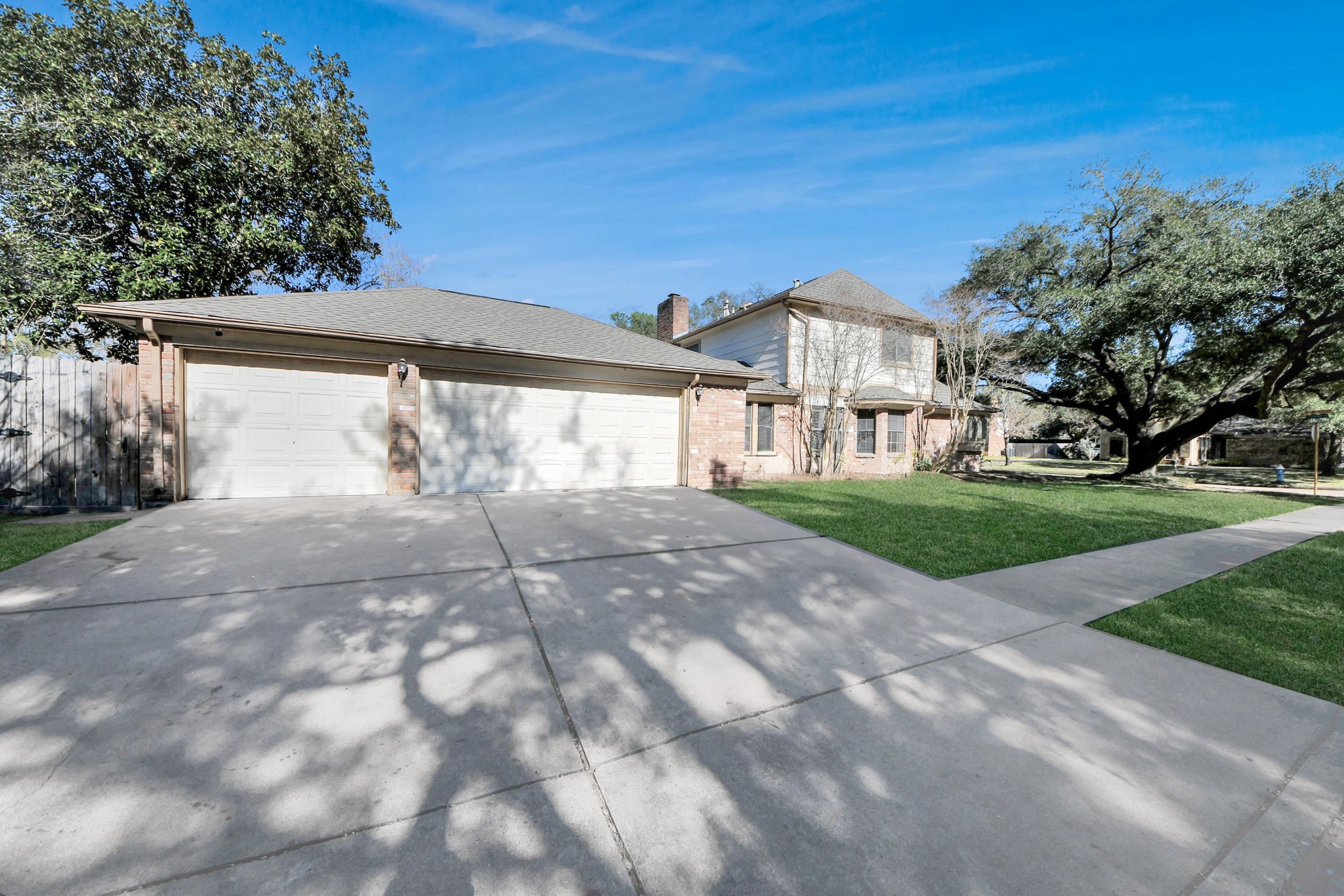 5003 Chantry Drive Houston, TX 77084 - Photo 2 of 49 a view of a house with a yard