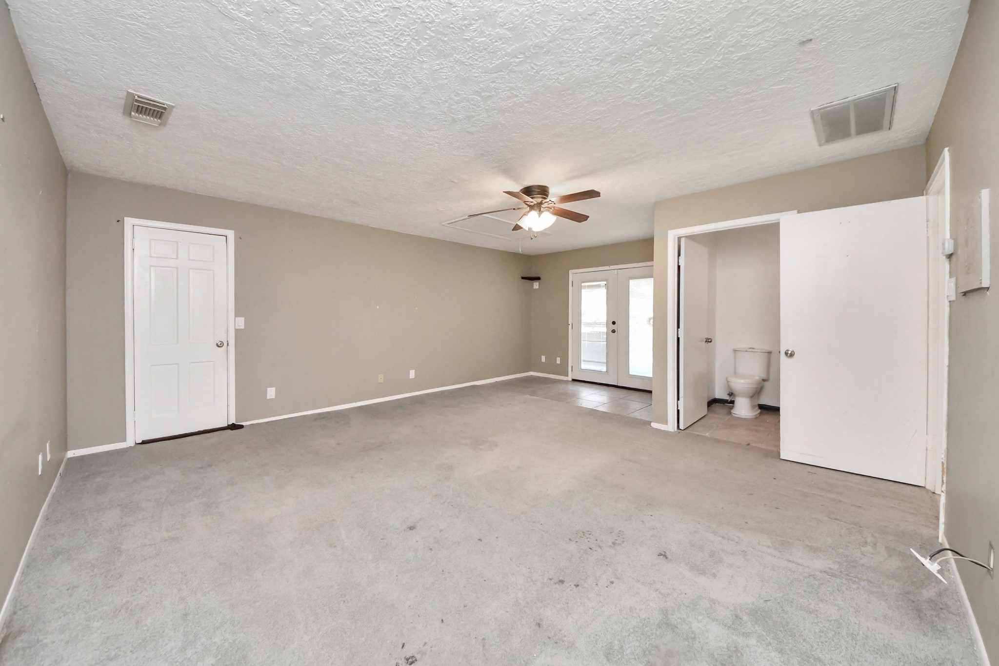 5003 Chantry Drive Houston, TX 77084 - Photo 42 of 49 a view of an empty room with a ceiling fan