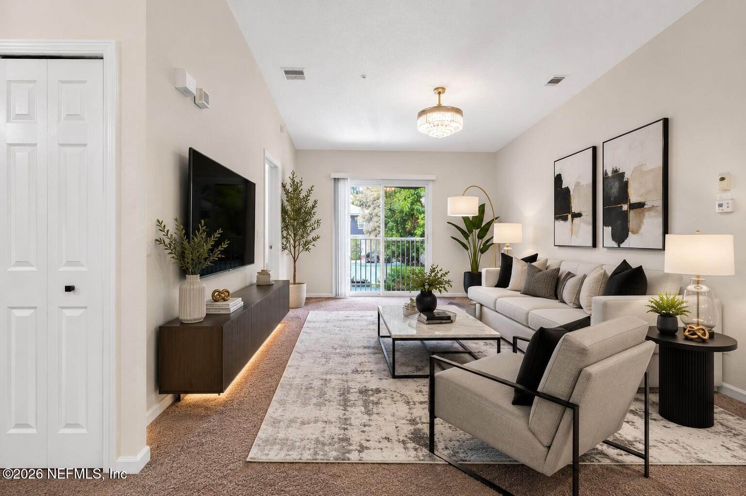 7920 Merrill Road, Unit 615 Jacksonville, FL 32277 - Photo 1 of 28 Virtualy Staged Living Area