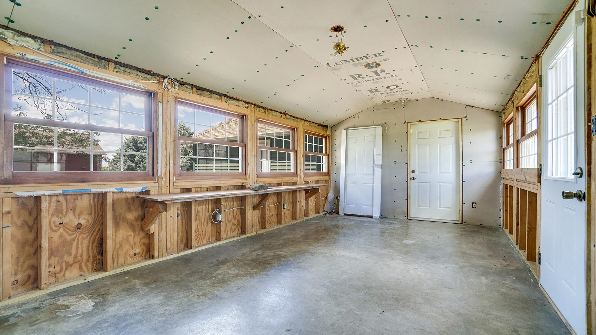 1813 Brooklyn Road Ashton, IL 61006 - Photo 12 of 43 a view of a big room with windows