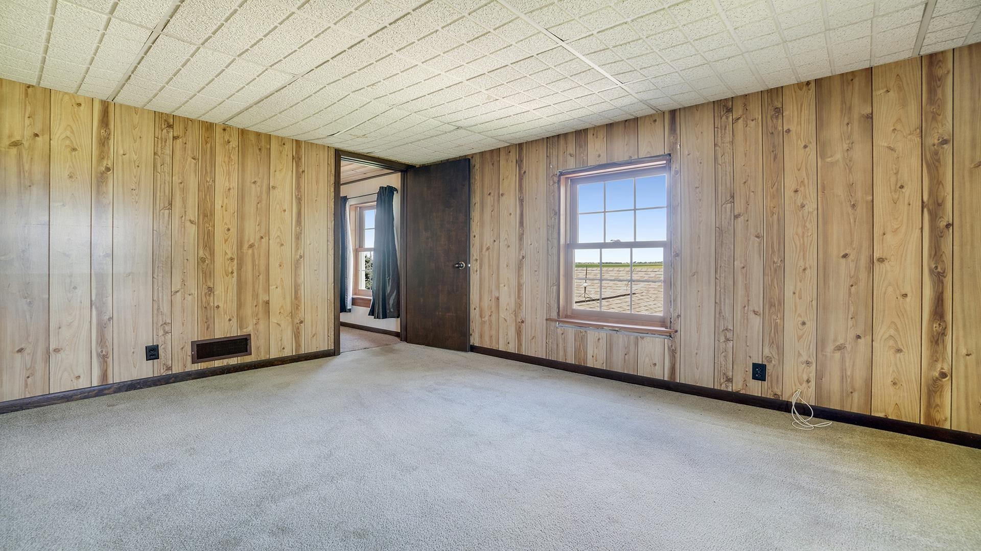 1813 Brooklyn Road Ashton, IL 61006 - Photo 18 of 43 an empty room with windows
