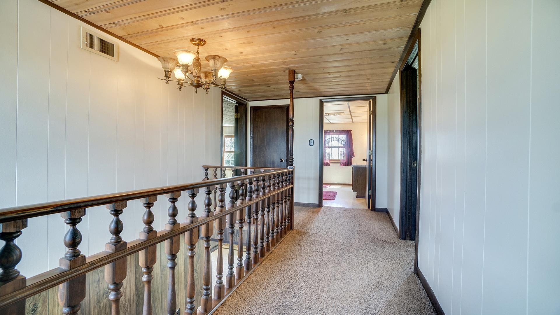 1813 Brooklyn Road Ashton, IL 61006 - Photo 19 of 43 a view of a porch with wooden floor and stairs