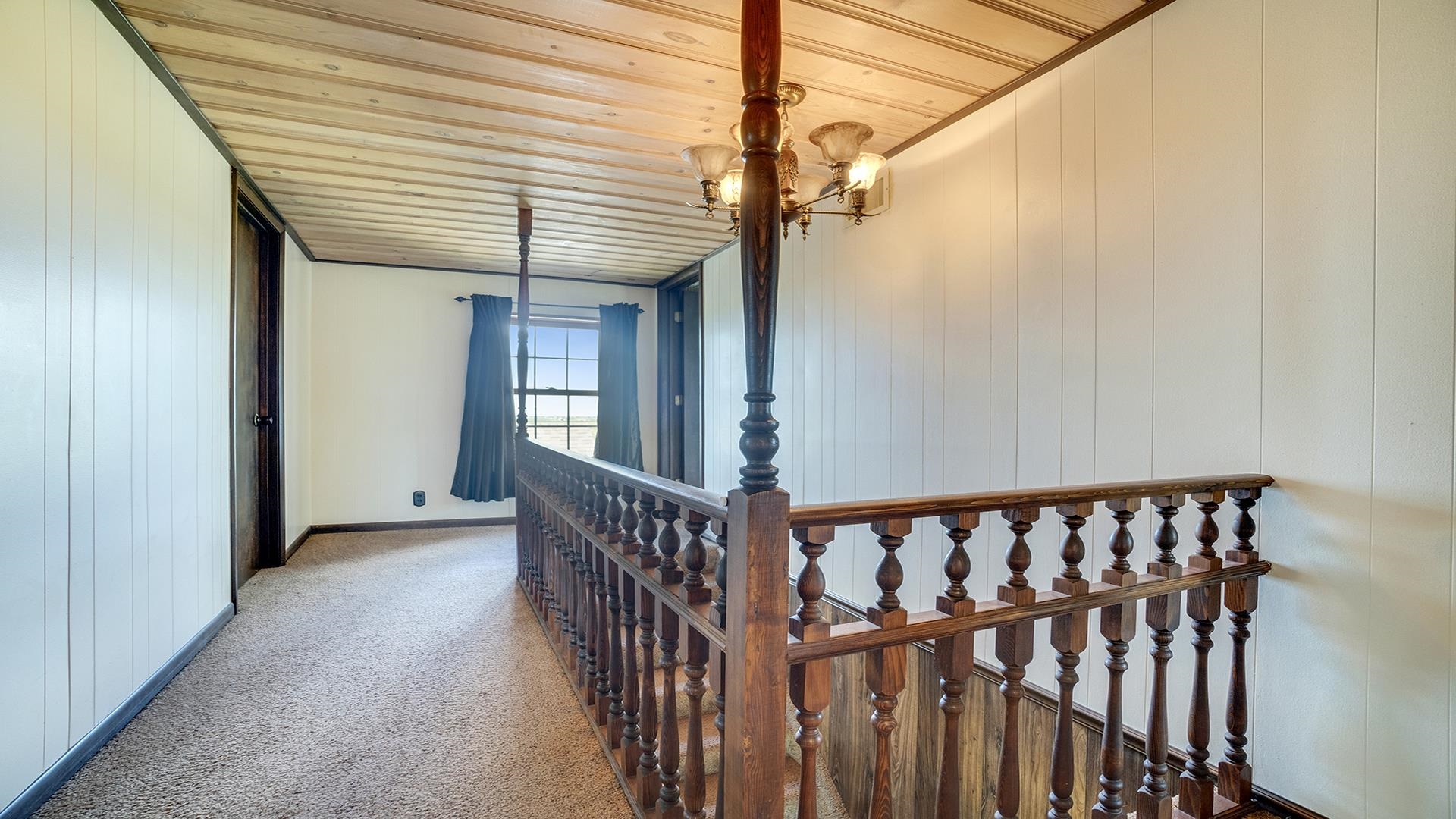 1813 Brooklyn Road Ashton, IL 61006 - Photo 20 of 43 a view of a hallway with wooden floor and staircase