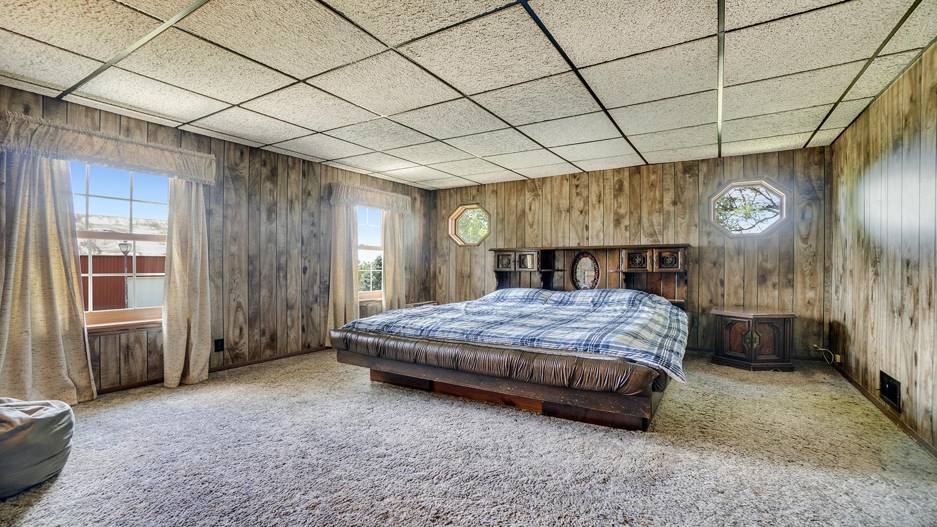 1813 Brooklyn Road Ashton, IL 61006 - Photo 22 of 43 a spacious bedroom with a bed and a cabinets