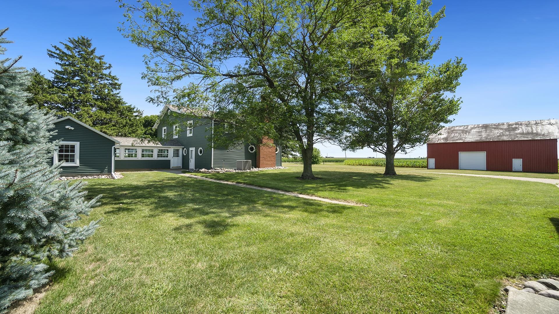 1813 Brooklyn Road Ashton, IL 61006 - Photo 38 of 43 a view of a house with a yard