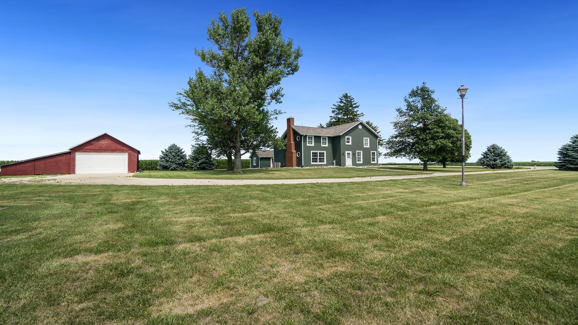 1813 Brooklyn Road Ashton, IL 61006 - Photo 39 of 43 a backyard of a house with lots of green space