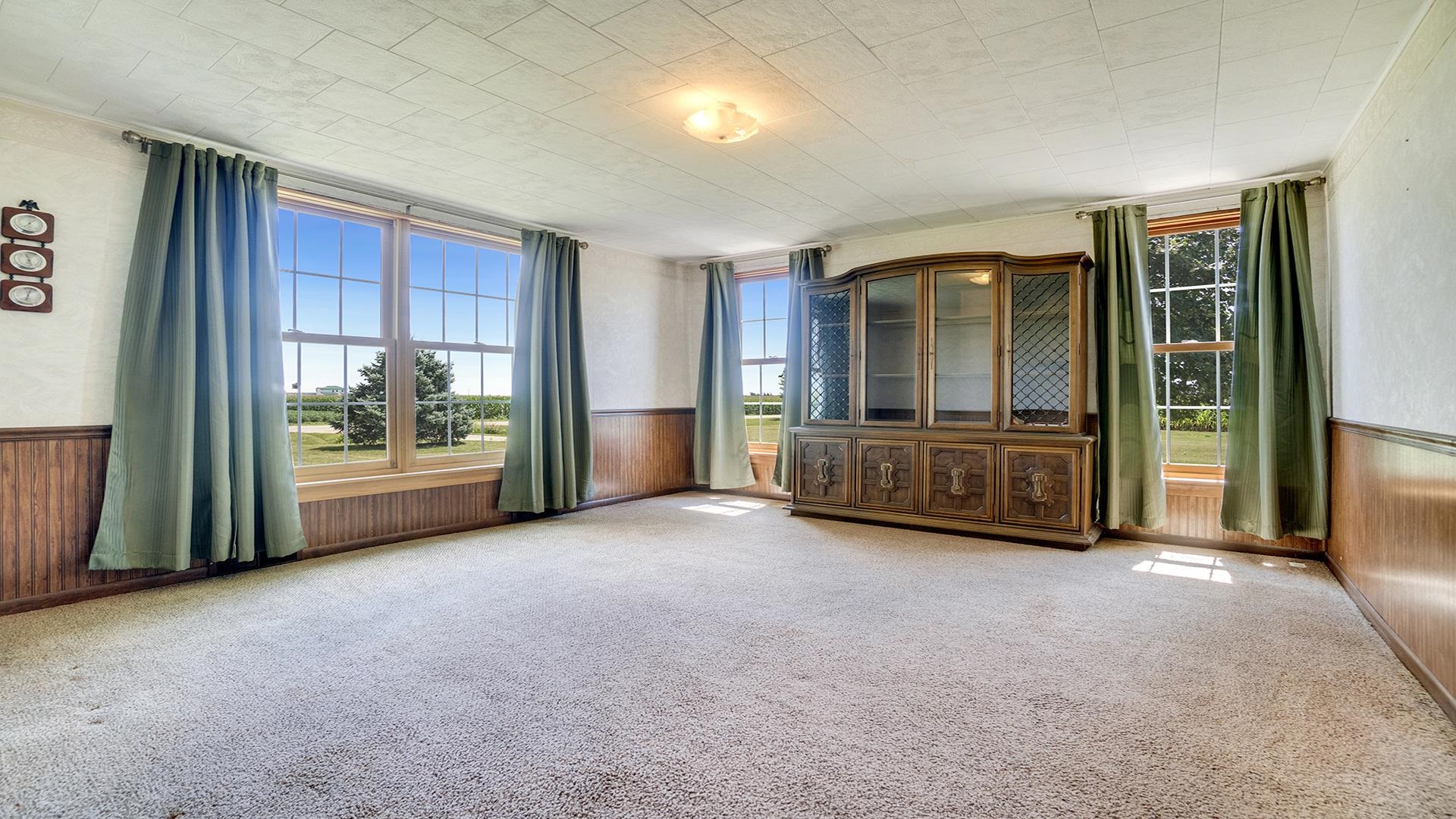 1813 Brooklyn Road Ashton, IL 61006 - Photo 9 of 43 a view of an empty room with glass door and balcony