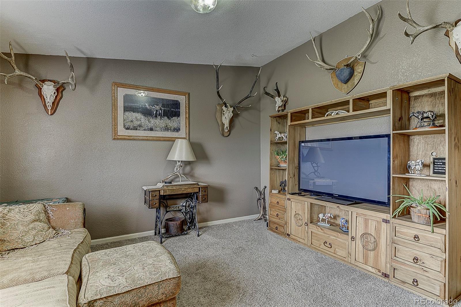 5255 North Yoder Road Yoder, CO 80864 - Photo 12 of 38 a living room with furniture