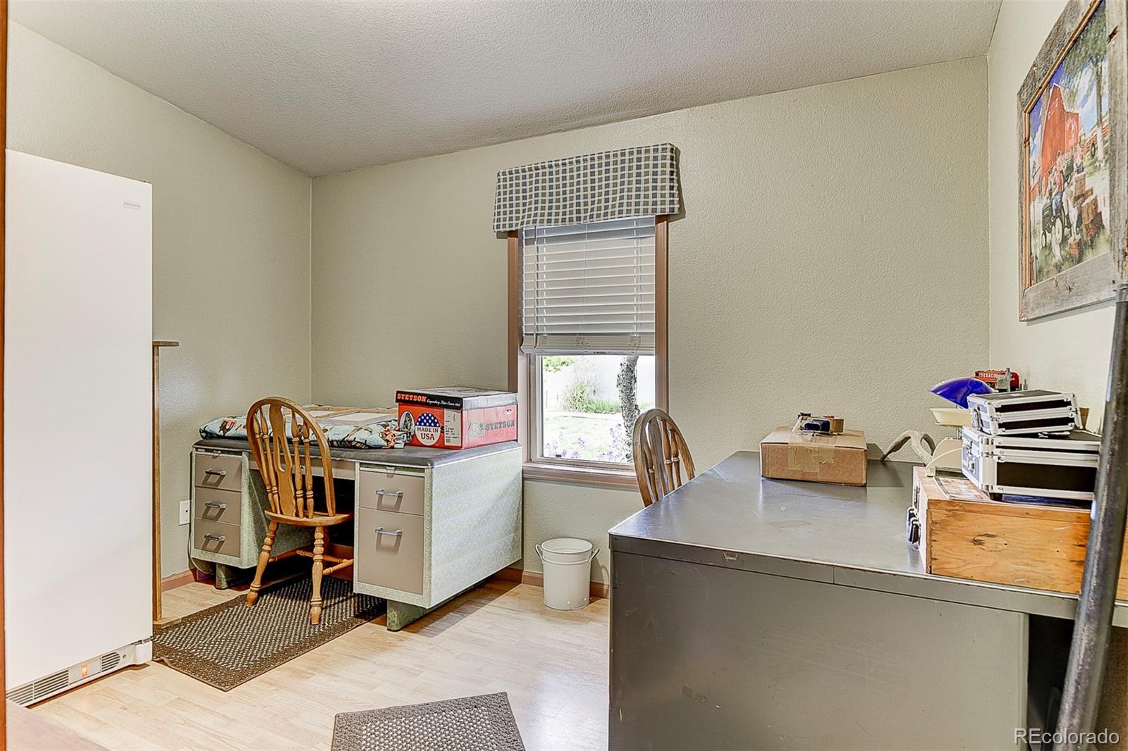 5255 North Yoder Road Yoder, CO 80864 - Photo 15 of 38 a storage room with furniture and a window
