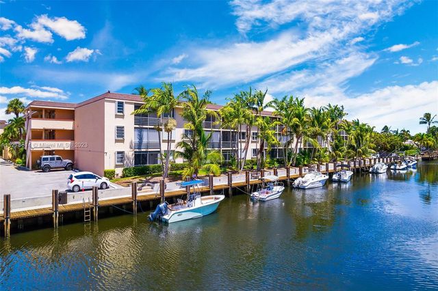 a view of swimming pool with outdoor seating