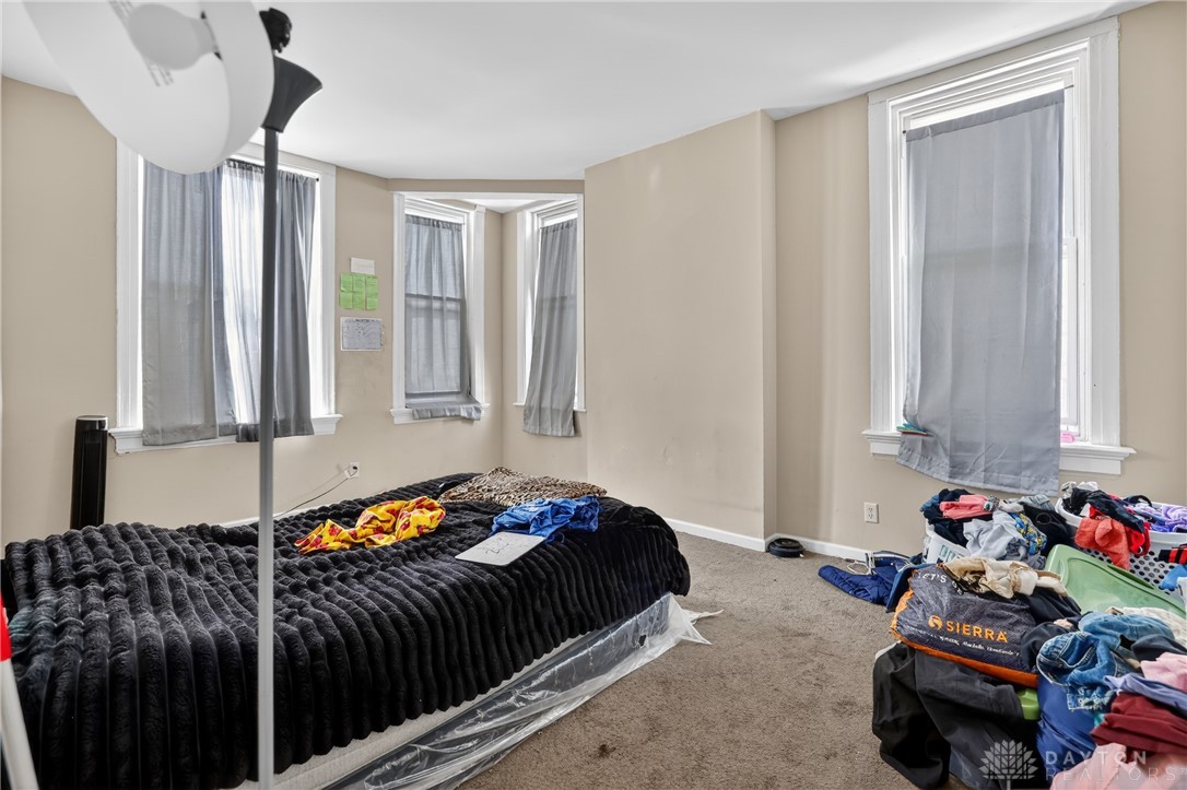 7045-7049 Montgomery Road Cincinnati, OH 45236 - Photo 38 of 68 This cozy bedroom provides a comfortable retreat with ample natural light.