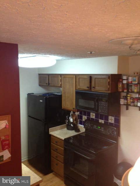 6450 Greenfield Road, Unit 305 Elkridge, MD 21075 - Photo 15 of 19 Kitchen