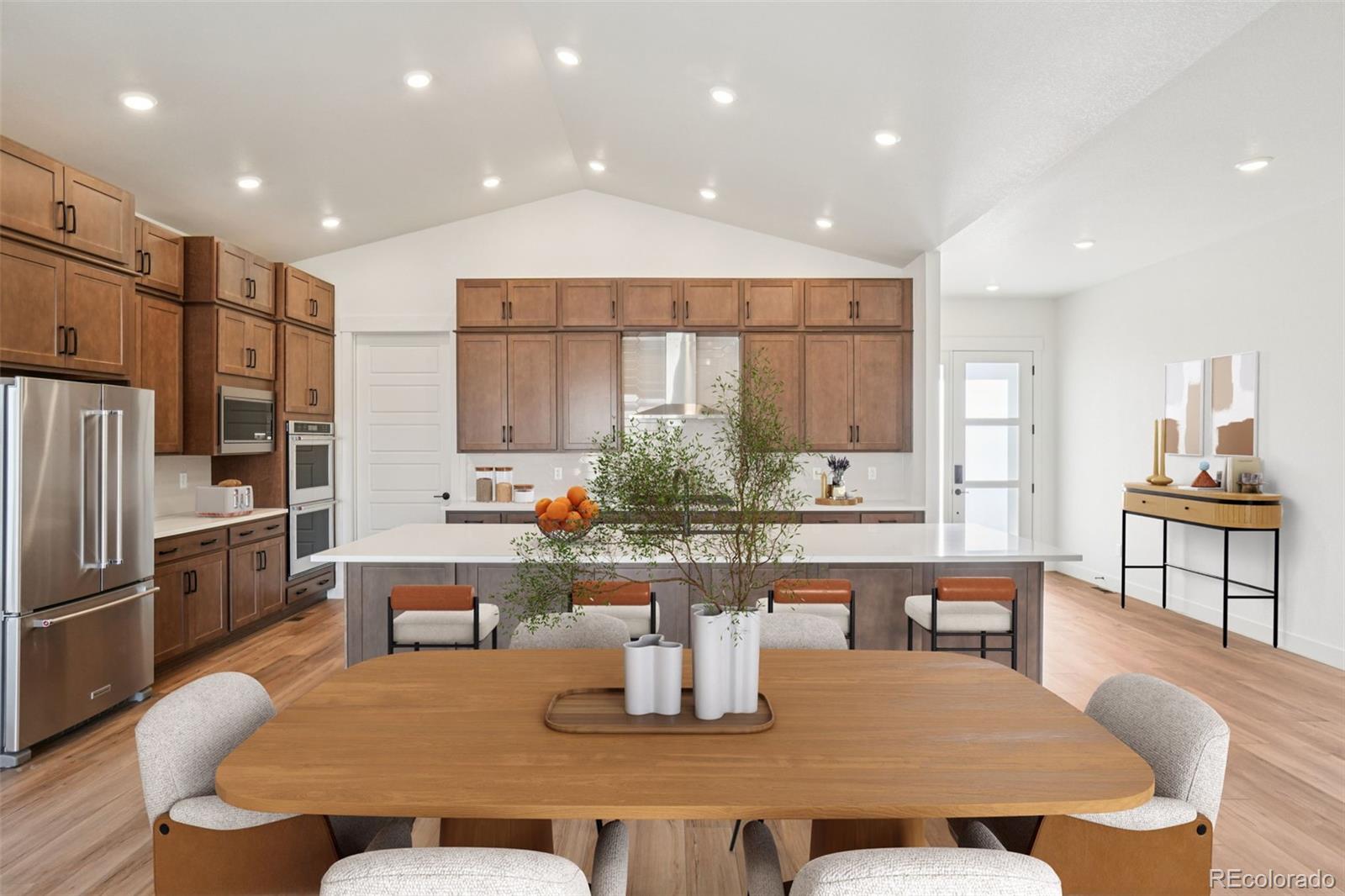 1738 Morningstar Way Fort Collins, CO 80524 - Photo 14 of 47 a dining room with furniture a window and kitchen view