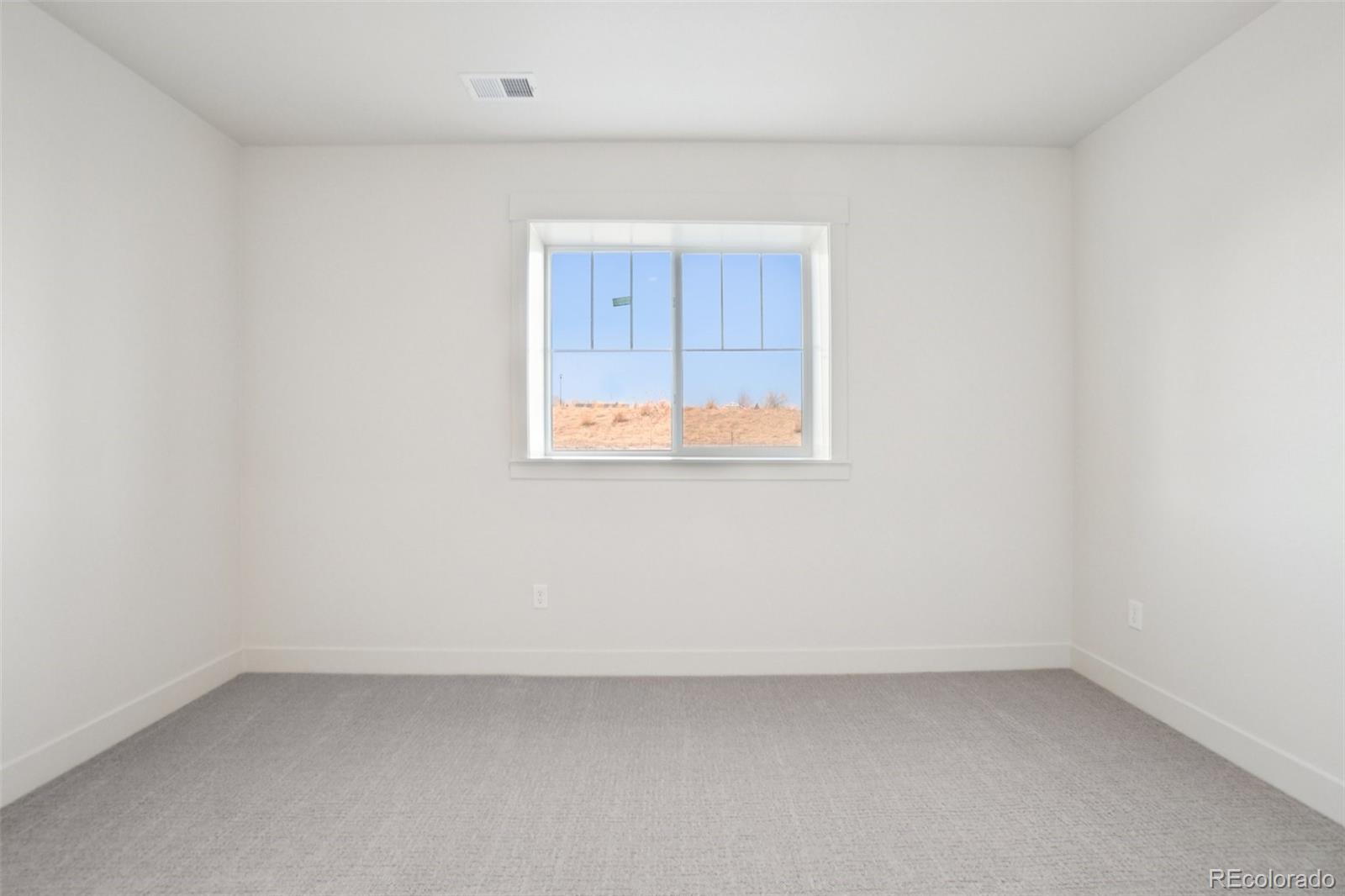 1738 Morningstar Way Fort Collins, CO 80524 - Photo 19 of 47 an empty room with a window