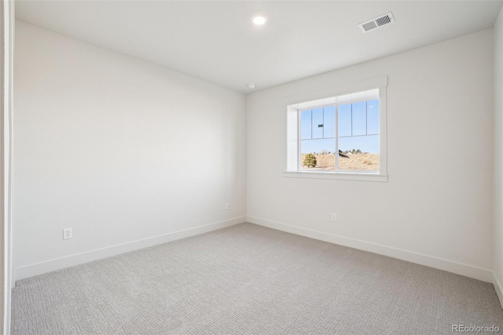 1738 Morningstar Way Fort Collins, CO 80524 - Photo 21 of 47 an empty room with a window