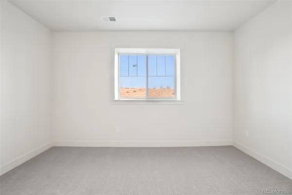 an empty room with a window