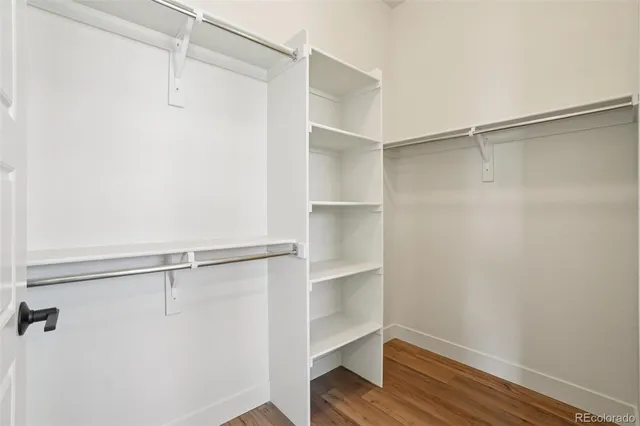 a view of an empty walk in closet