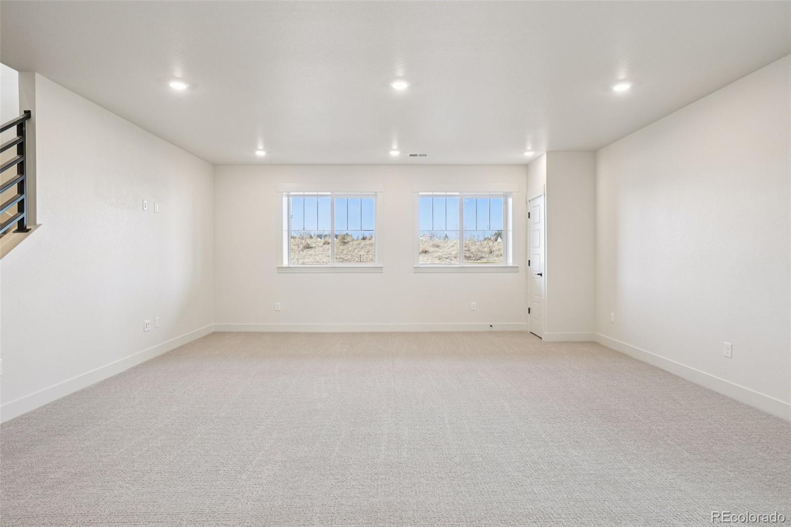1738 Morningstar Way Fort Collins, CO 80524 - Photo 39 of 47 a view of a kitchen with a sink and a refrigerator