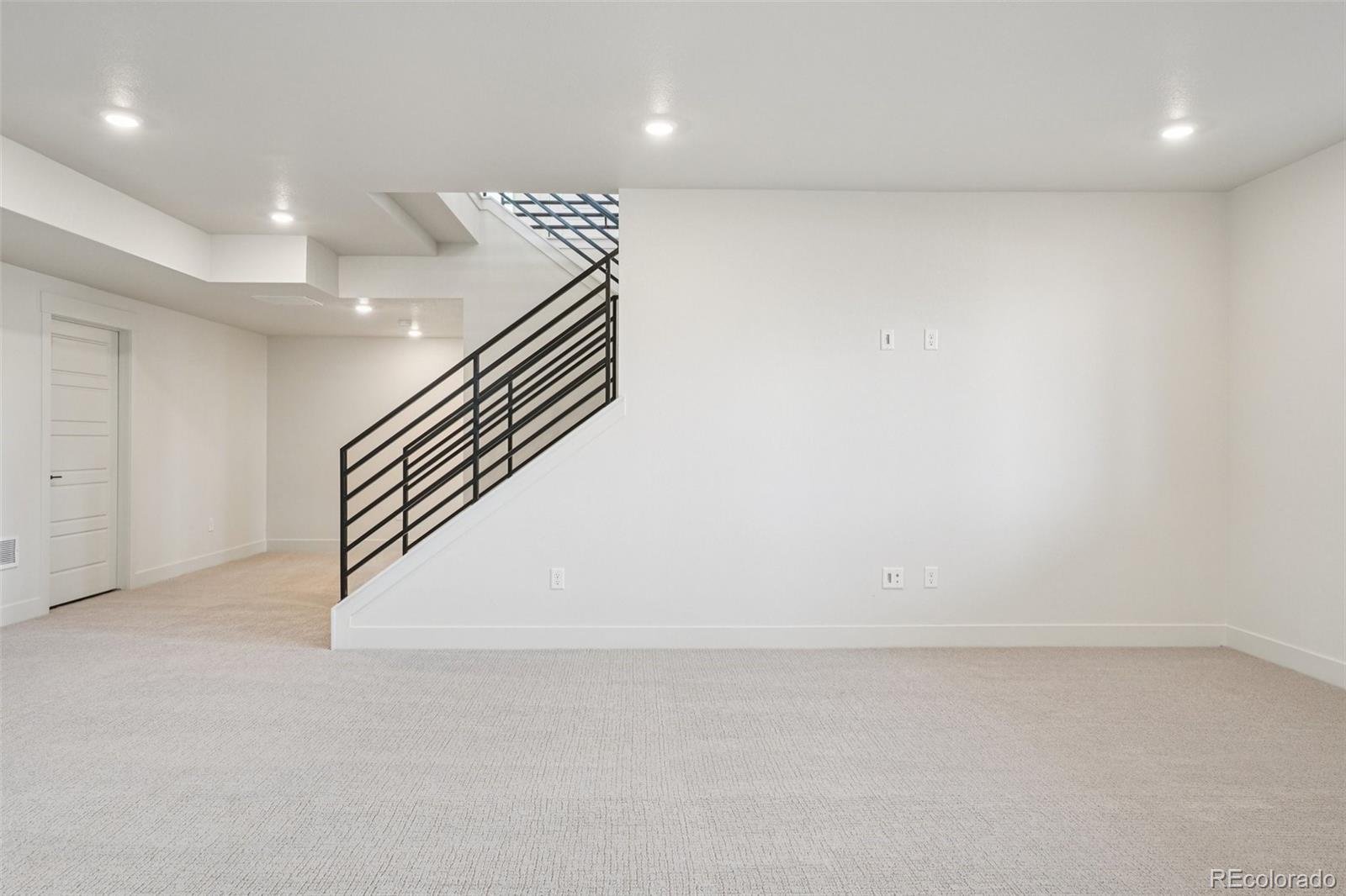 1738 Morningstar Way Fort Collins, CO 80524 - Photo 42 of 47 an empty room with wooden floor