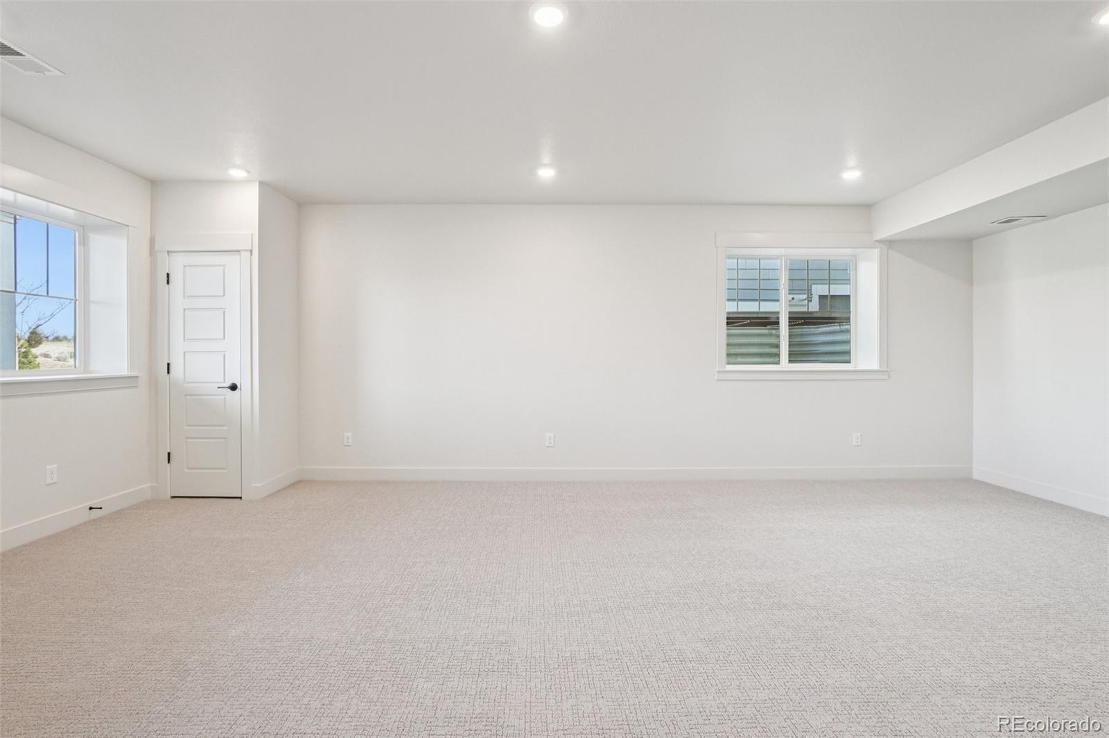 1738 Morningstar Way Fort Collins, CO 80524 - Photo 43 of 47 an empty room with windows
