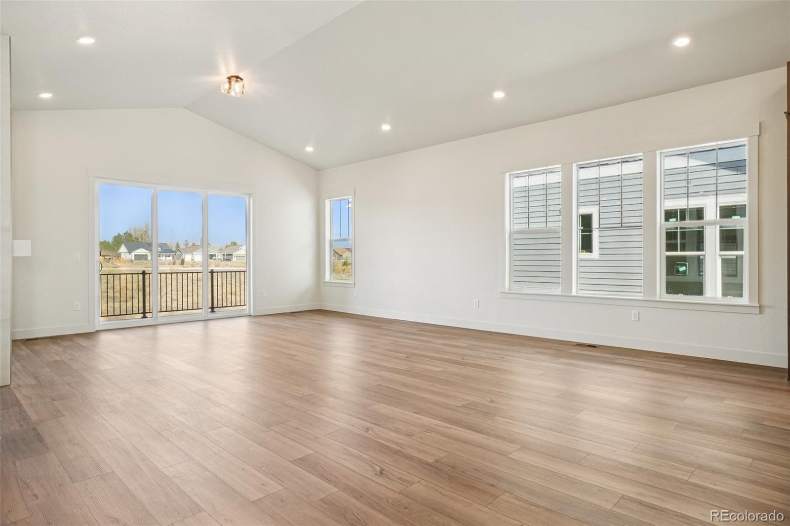 1738 Morningstar Way Fort Collins, CO 80524 - Photo 5 of 47 a view of a kitchen with a sink and a large window