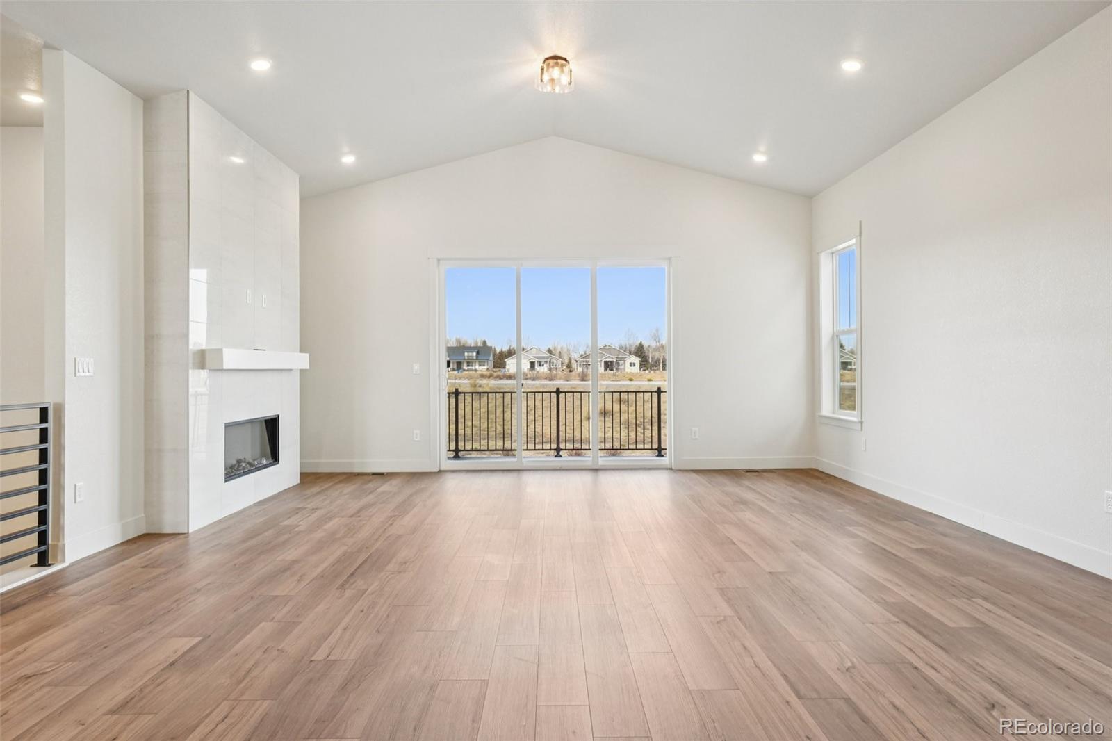 1738 Morningstar Way Fort Collins, CO 80524 - Photo 6 of 47 a view of a kitchen with a sink and a stove top oven