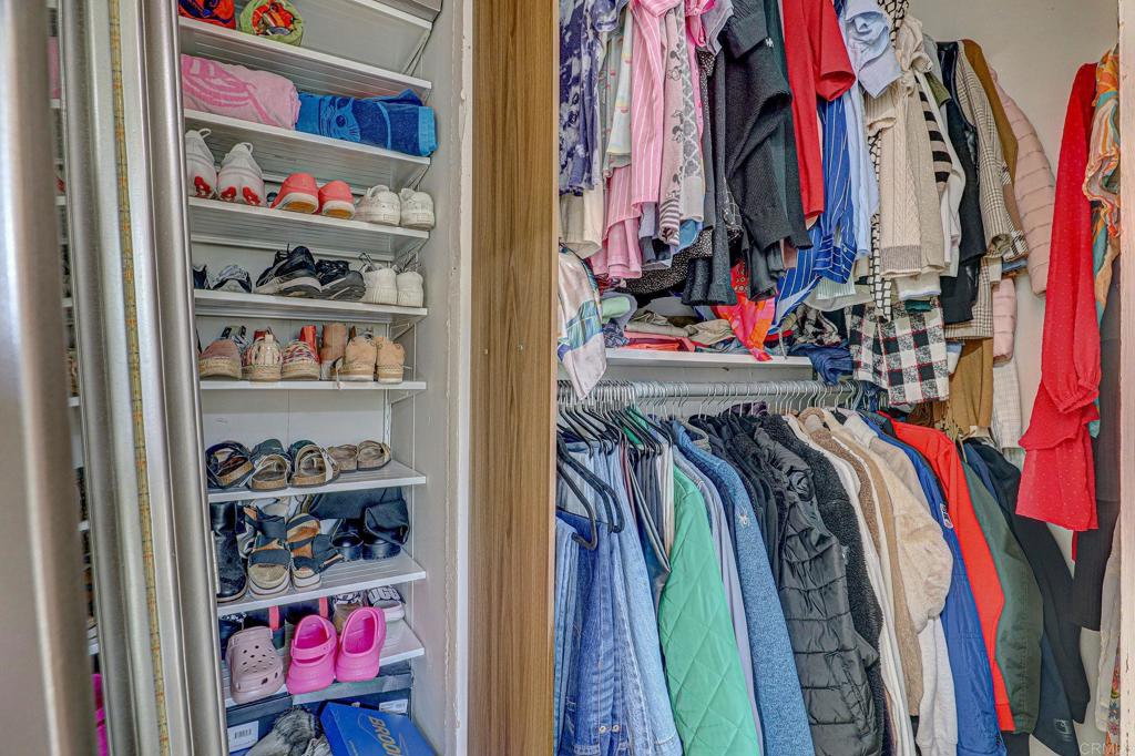 2515 Sweetwater Road, Unit SPC #23 Spring Valley, CA 91977 - Photo 18 of 21 a view of walk in closet with clothes and shoes