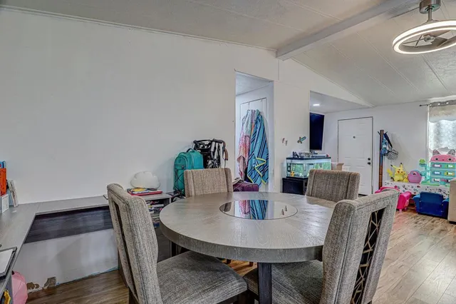 a view of a dining room with furniture