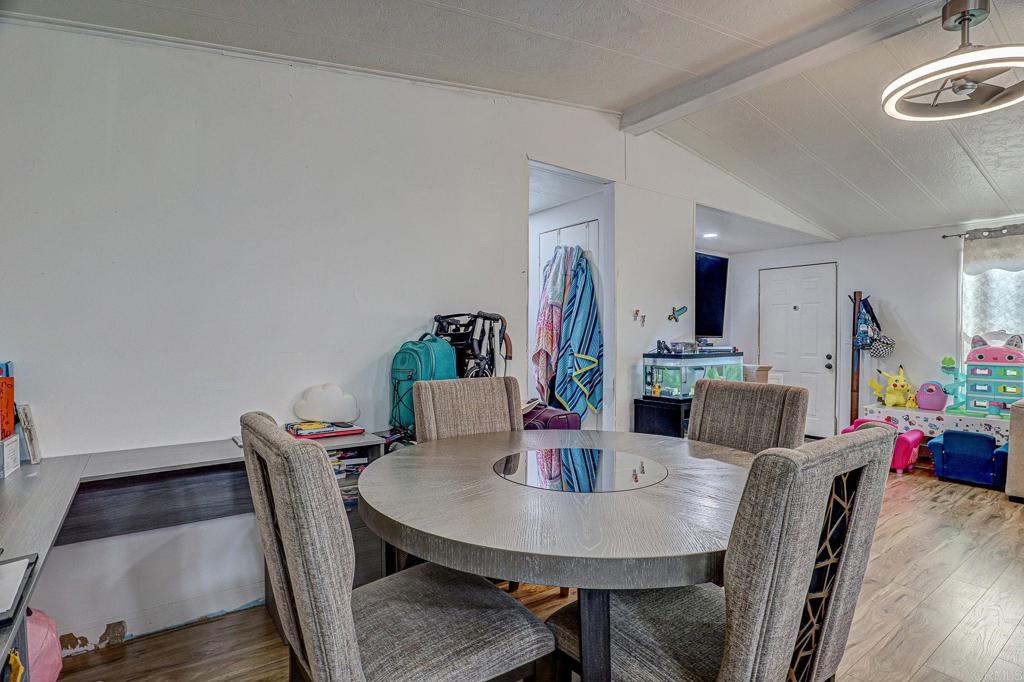 2515 Sweetwater Road, Unit SPC #23 Spring Valley, CA 91977 - Photo 8 of 21 a view of a dining room with furniture