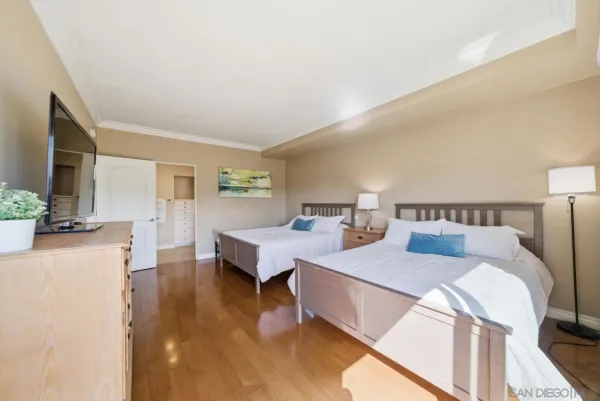 a bed room with a bed and a couch