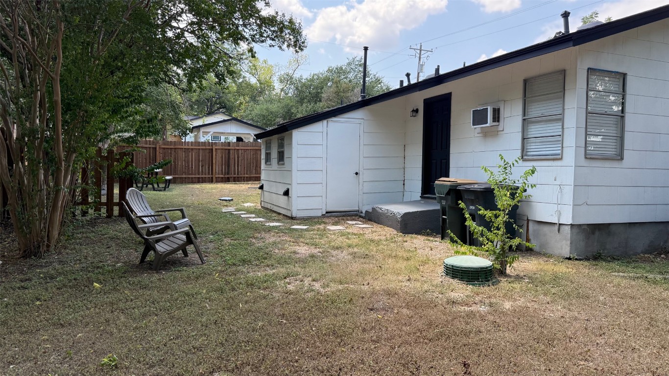 1802 East University Avenue, Unit B Georgetown, TX 78626 - Photo 2 of 12 a view of a backyard with a sitting area