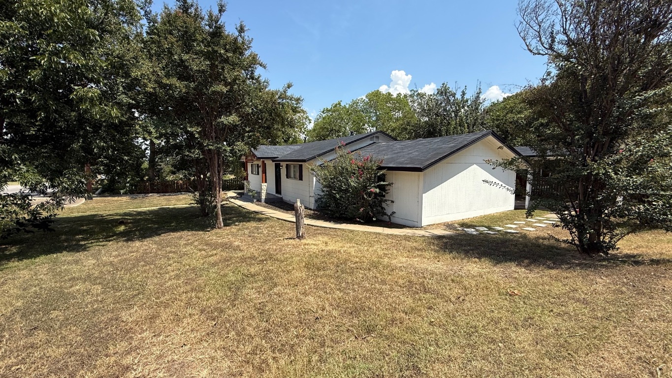 1802 East University Avenue, Unit B Georgetown, TX 78626 - Photo 6 of 12 a view of backyard of the house