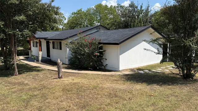 a house view with a outdoor space